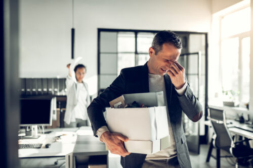 man fired from job carrying box of his stuff
